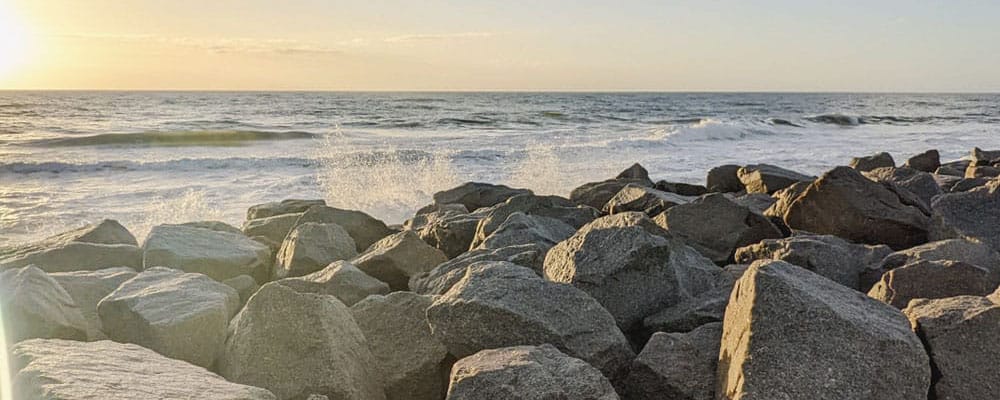 Ocean waves breaking along the rocky shoreline